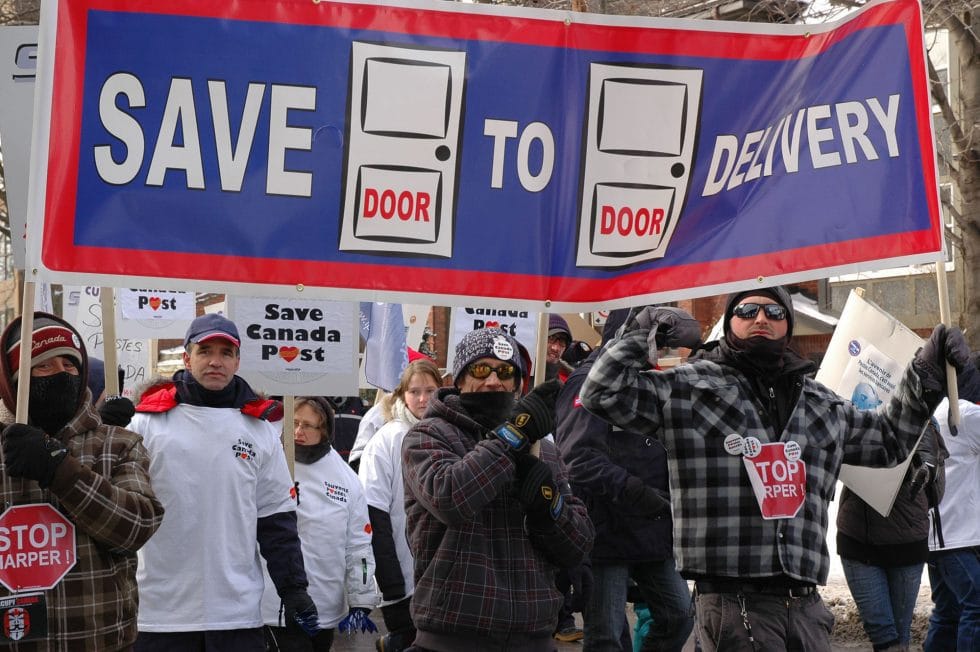 Canada Post's Financial Crisis: Report Calls For End To Door-to-Door Mail Delivery Canada Post's Financial Crisis: Report Calls For End To Door-to-Door Mail Delivery