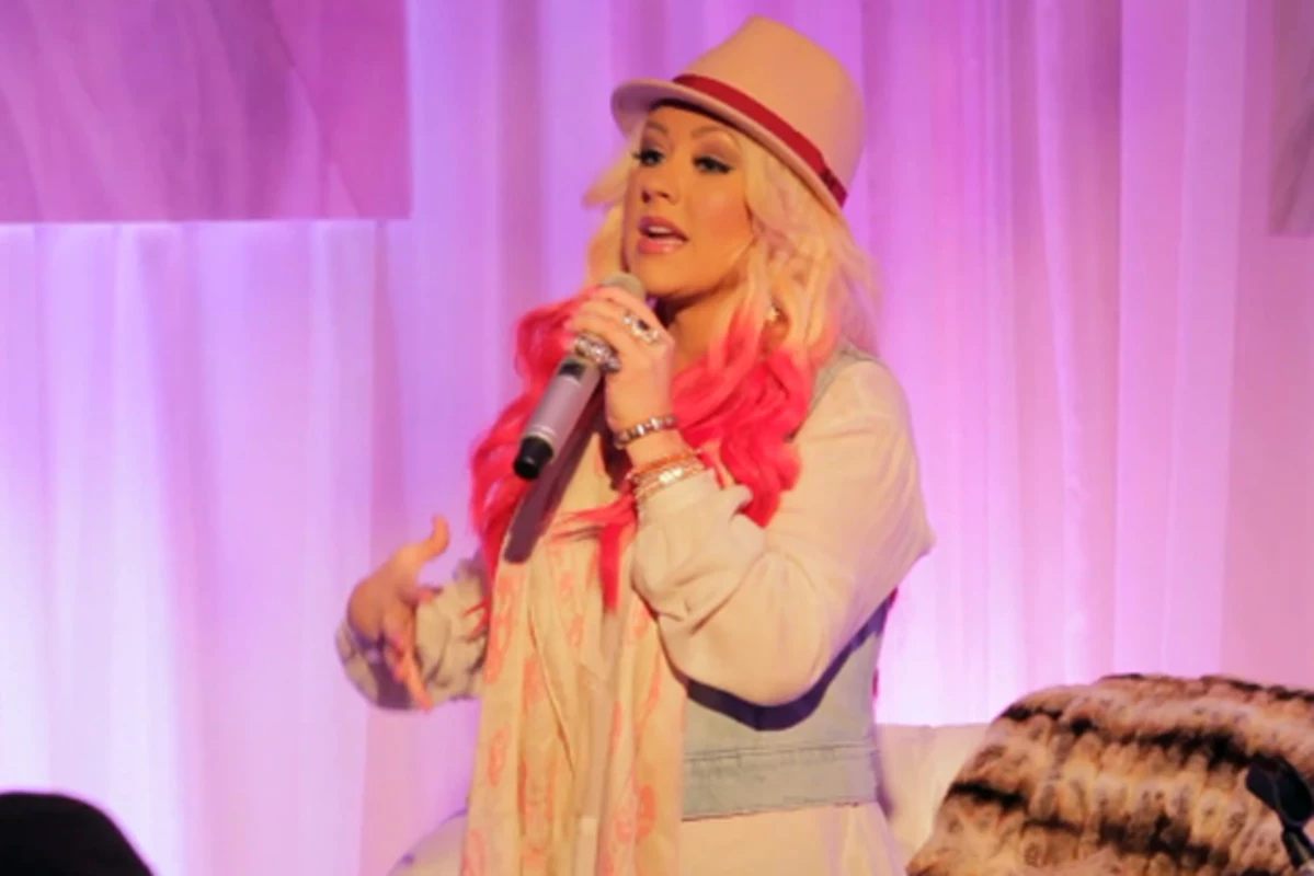 Photoshopped Perfection? Christina Aguilera's Latest Images Ignite Discussion Photoshopped Perfection? Christina Aguilera's Latest Images Ignite Discussion